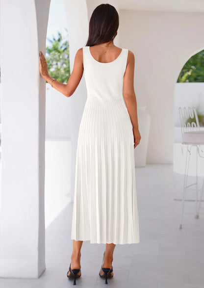 Robe mi-longue plissée en maille côtelée — col carré, sans manches, coupe trapèze fluide, élégante pour cocktail et soirée