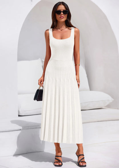 Robe mi-longue plissée en maille côtelée — col carré, sans manches, coupe trapèze fluide, élégante pour cocktail et soirée