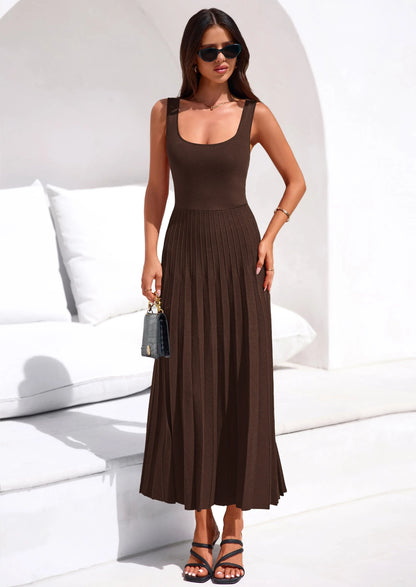 Robe mi-longue plissée en maille côtelée — col carré, sans manches, coupe trapèze fluide, élégante pour cocktail et soirée