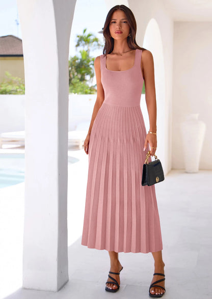 Robe mi-longue plissée en maille côtelée — col carré, sans manches, coupe trapèze fluide, élégante pour cocktail et soirée