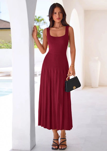 Robe mi-longue plissée en maille côtelée — col carré, sans manches, coupe trapèze fluide, élégante pour cocktail et soirée