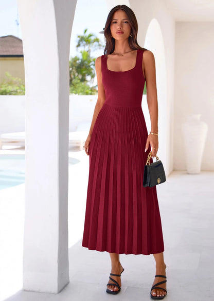 Robe mi-longue plissée en maille côtelée — col carré, sans manches, coupe trapèze fluide, élégante pour cocktail et soirée