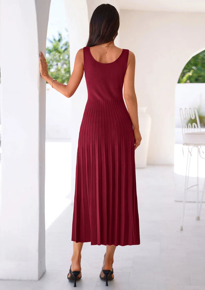 Robe mi-longue plissée en maille côtelée — col carré, sans manches, coupe trapèze fluide, élégante pour cocktail et soirée