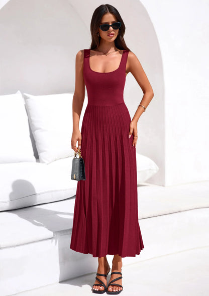 Robe mi-longue plissée en maille côtelée — col carré, sans manches, coupe trapèze fluide, élégante pour cocktail et soirée